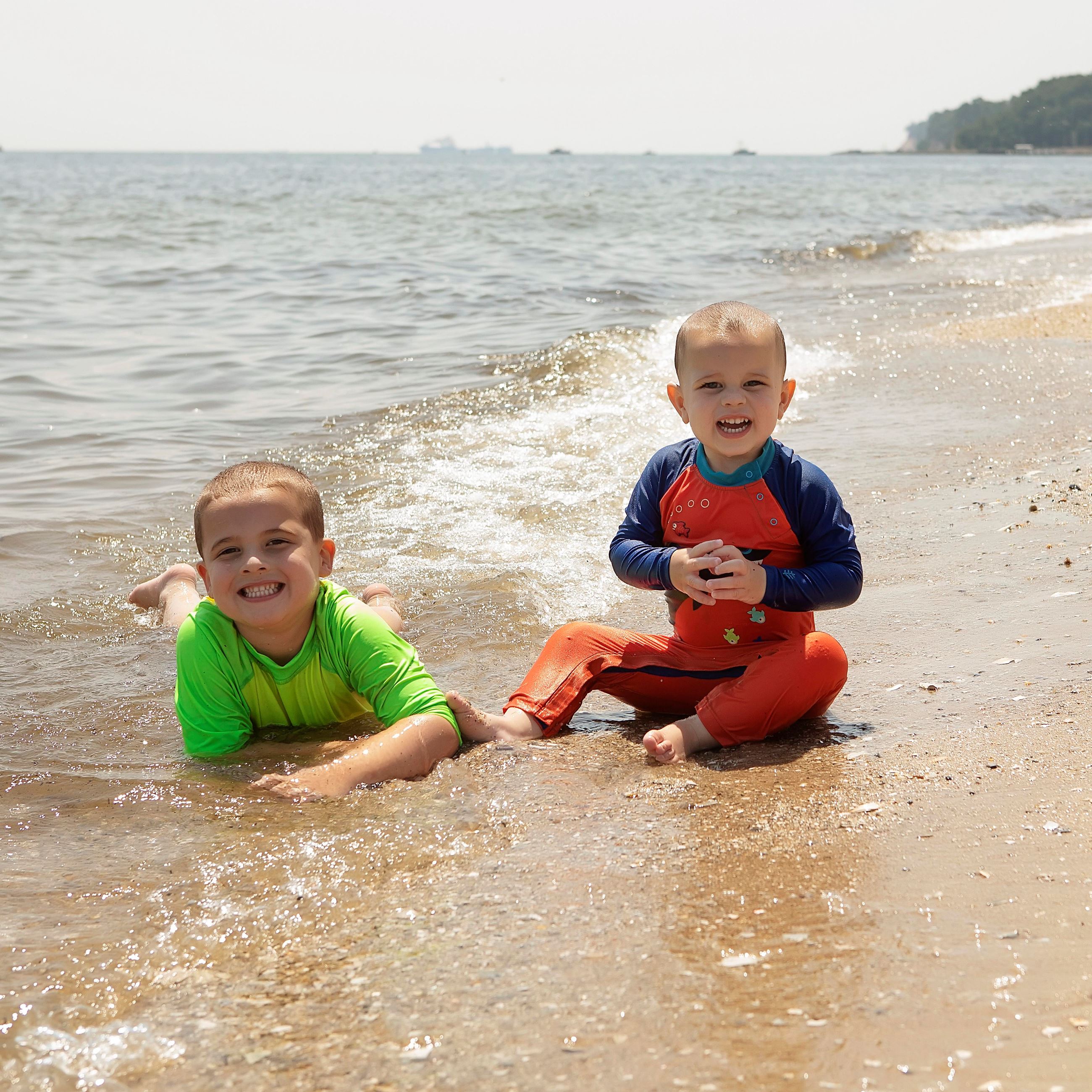 Kids playing on the beach at Flag Ponds